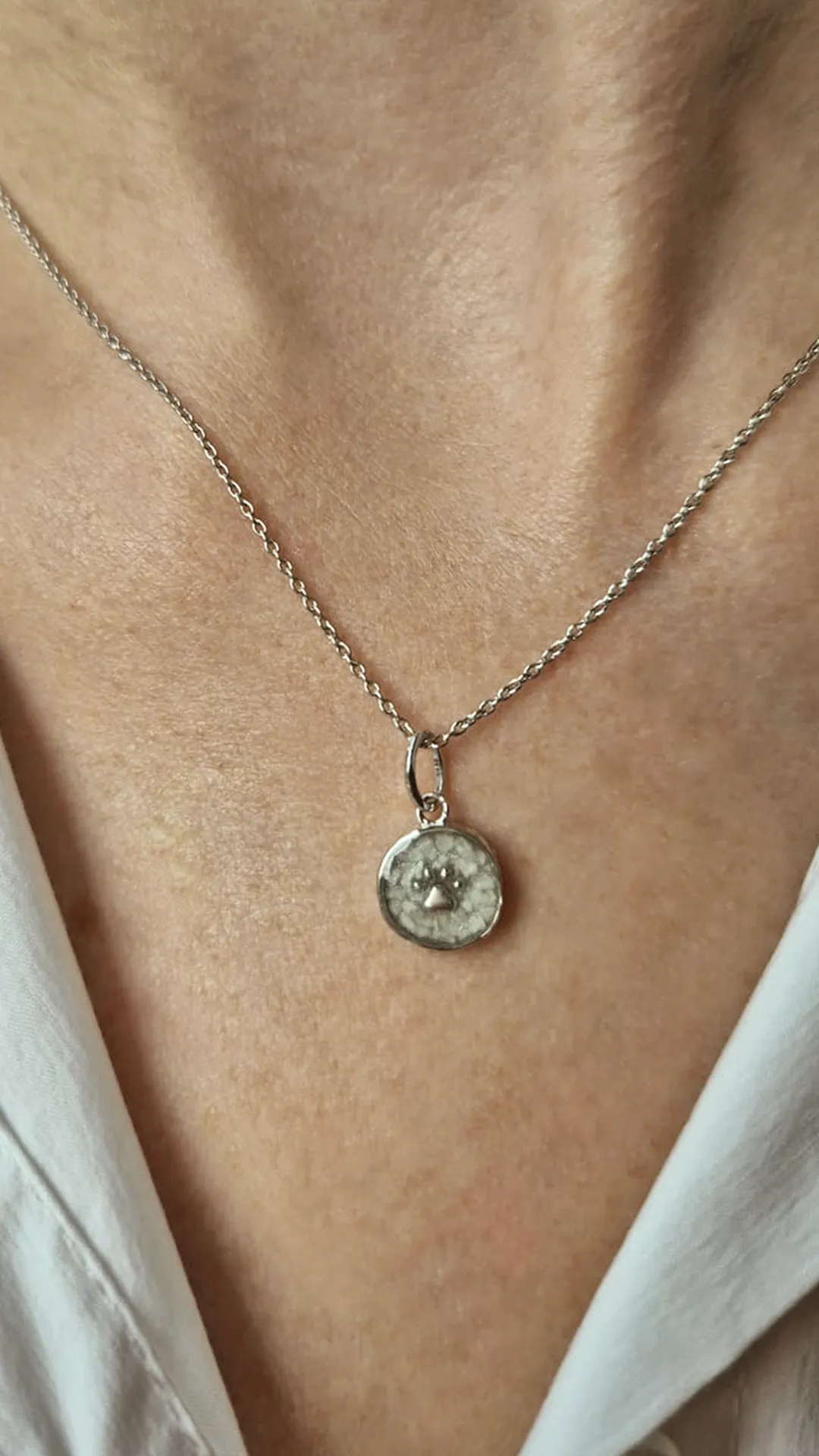 Pootje ashanger/assieraad zilver