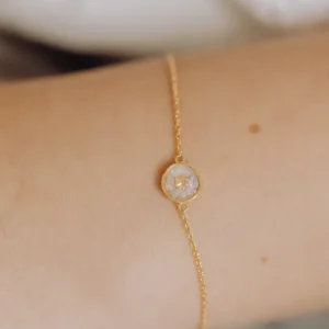Pootje as armband/assieraad model pols